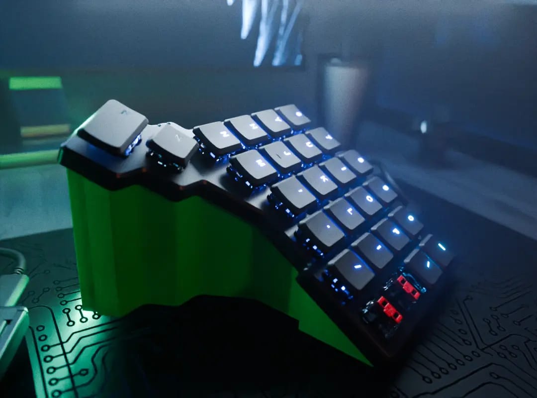 Close up of a right Voyager that has a green printed stand attached