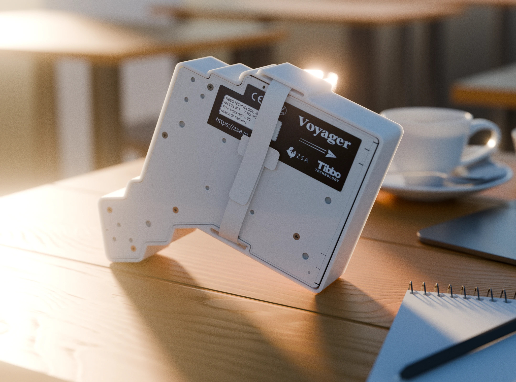 Bottom of the Voyager minimal travel case showing strap loops and Voyager branding label