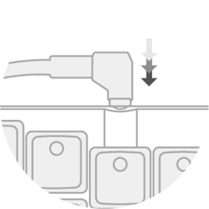 Putting a keycap on the keyswitch, arrows pointing down indicating direction of force