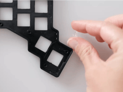 Holding the small translucent piece for the LEDs